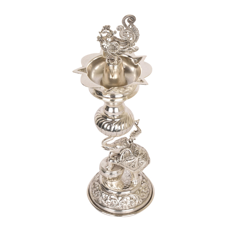 Timeless Radiance: Silver-Coated Brass Elephant and Peacock Oil Lamp