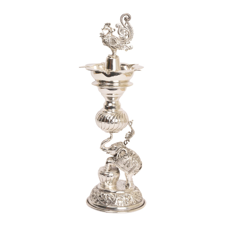 Timeless Radiance: Silver-Coated Brass Elephant and Peacock Oil Lamp