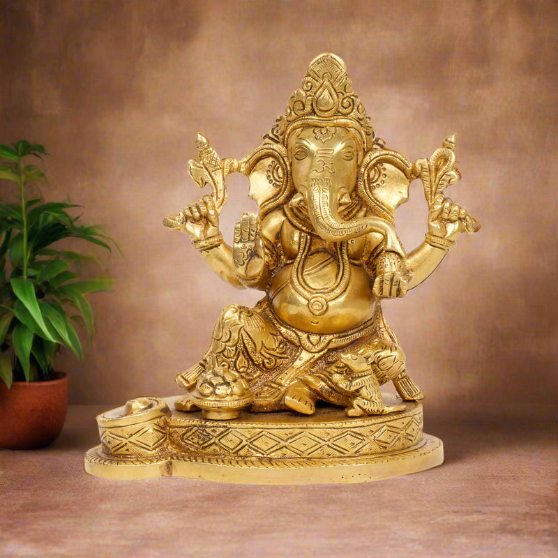 Benevolent Grace: Handcrafted Bronze Ganesha with Sweets