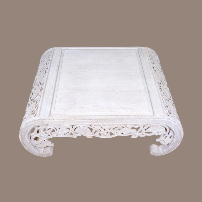 Handcrafted Wooden Coffee Table with Intricate Carved Detailing