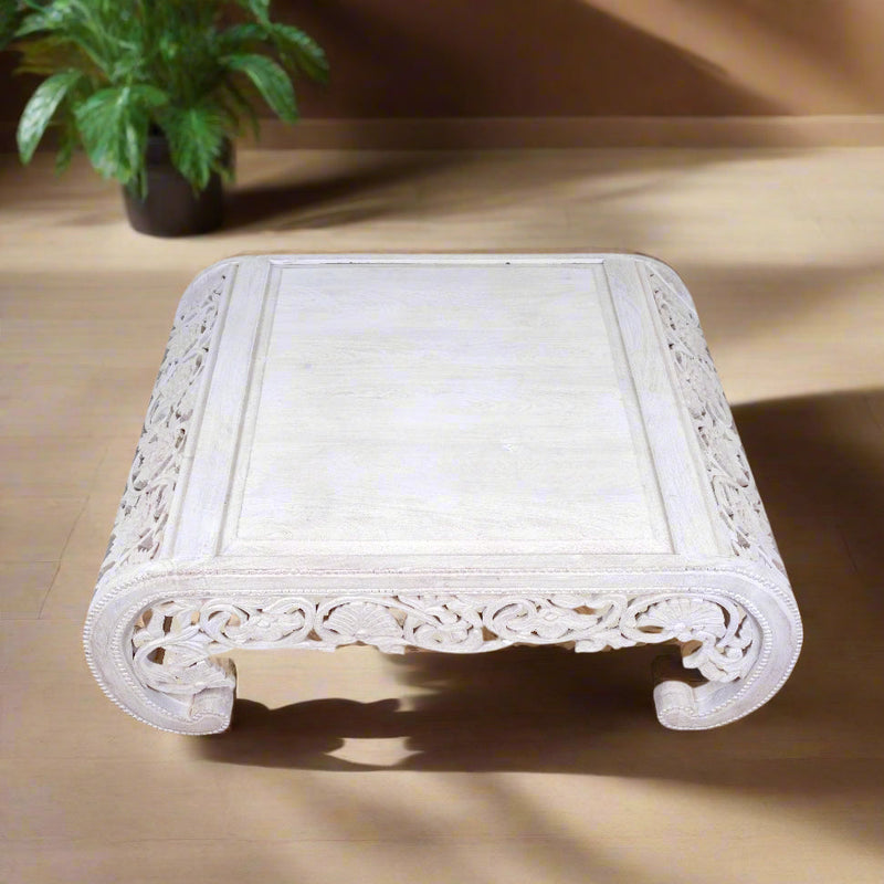 Handcrafted Wooden Coffee Table with Intricate Carved Detailing