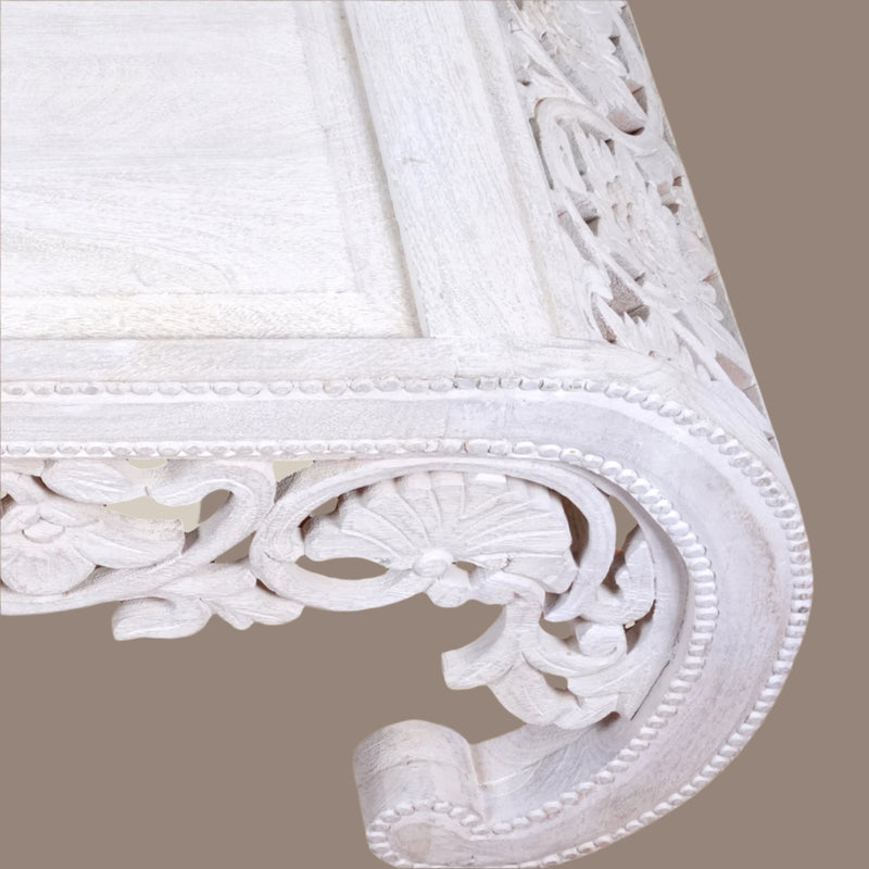 Handcrafted Wooden Coffee Table with Intricate Carved Detailing